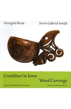 Coperta cărții 'Crestături în lemn. Wood carvings - Georgeta Roșu, Sorin Gabriel Ioniță'