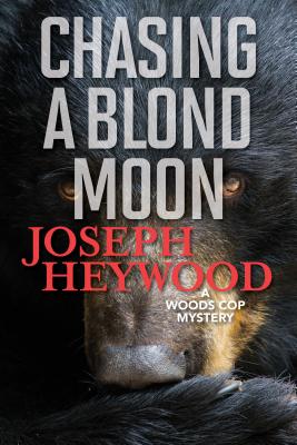 Chasing a Blond Moon: A Woods Cop Mystery - Joseph Heywood