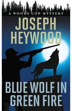 Coperta cărții 'Blue Wolf in Green Fire: A Woods Cop Mystery - Joseph Heywood'