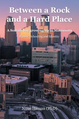 Between a Rock and a Hard Place: A Somali boy growing up in Minnesota: Family, Schooling and Identity - Nuur Hassan (phd)