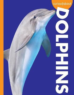 Curious about Dolphins - Annie C. Holdren