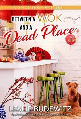 Between a Wok and a Dead Place - Leslie Budewitz