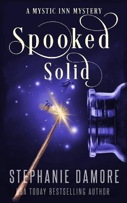 Spooked Solid: A Paranormal Cozy Mystery - Stephanie Damore